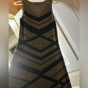 Black and Olive Geometric Dress

Stretch sweater like fabric is super comfy